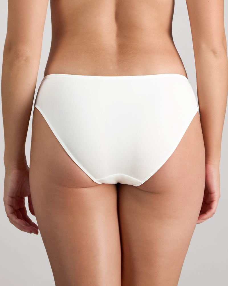 Model wears Renee Bikini in WHITE. On body back view