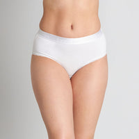 Model wears Cotton Logo Full Brief in WHITE. On body front view
