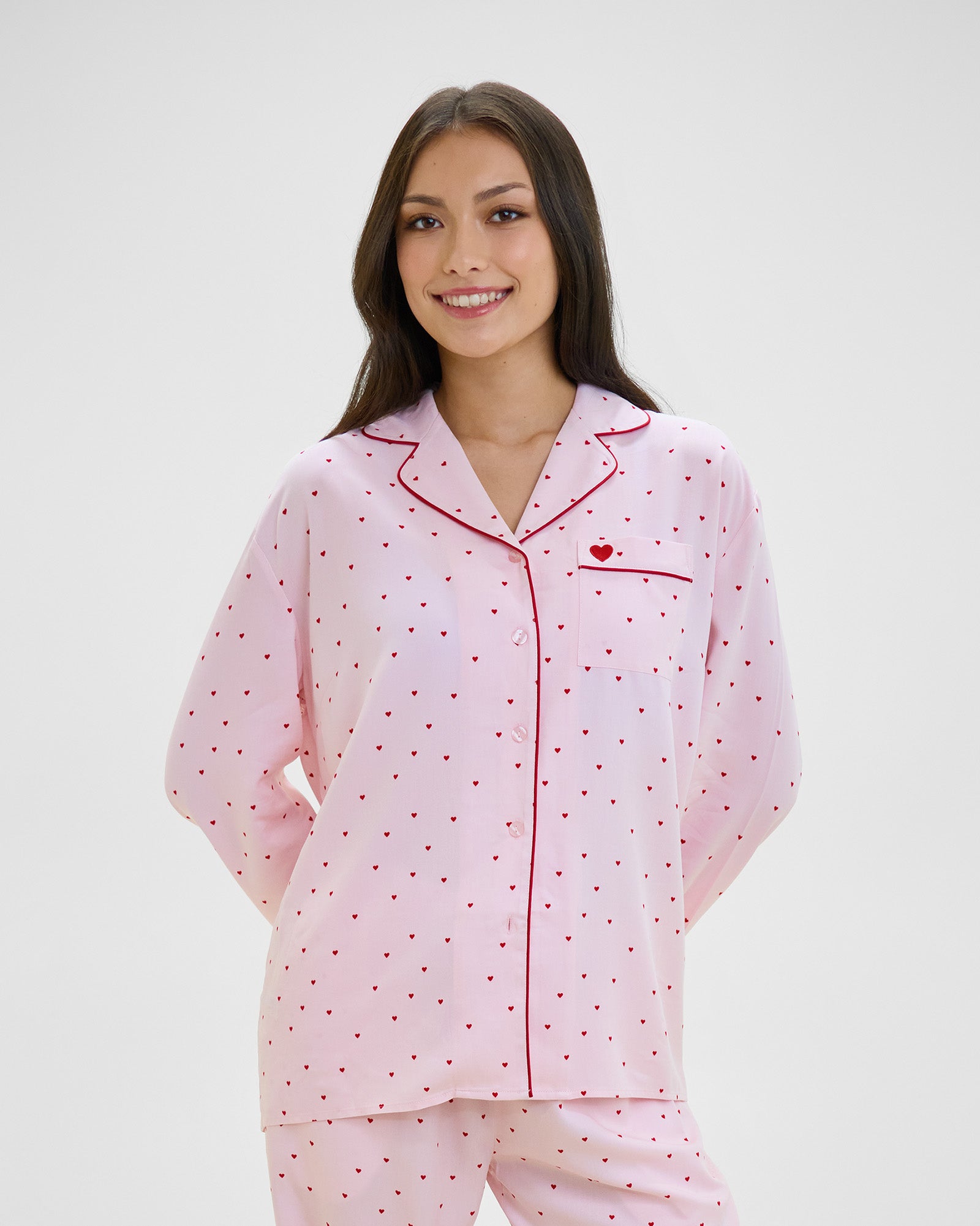 Model wears Hearts In Cabana Long Sleeve Pj Top in MINI HEART PRINT. On body front view
