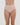 Model wears Seamless Soft Full Brief in LATTE. On body front view