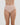 Model wears Seamless Soft Full Brief in LATTE. On body front view