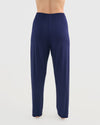 Model wears Bamboo Bliss Long PJ Pant in NAVY BLAZER. On body back view