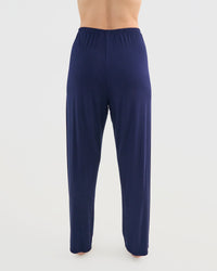 Model wears Bamboo Bliss Long PJ Pant in NAVY BLAZER. On body back view