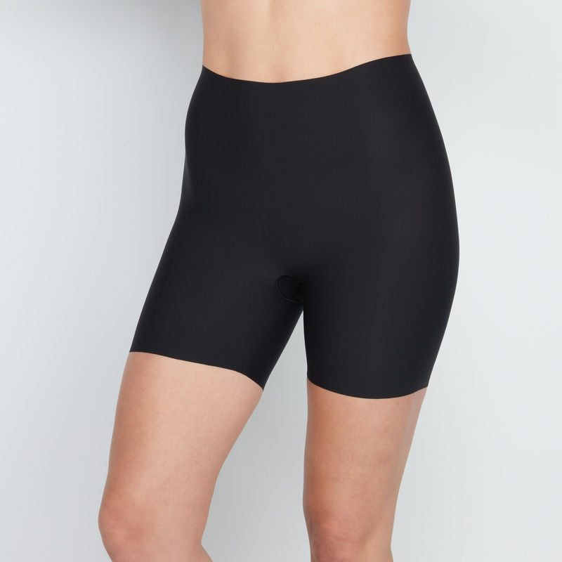 Model wears Everyday Light Hold Chafer Short in BLACK. On body front view
