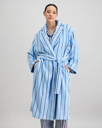 Model wears Riviera Robe in COOL BLUE. On body front view