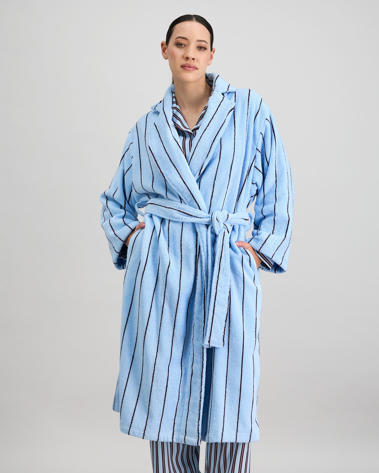 Model wears Riviera Robe in COOL BLUE. On body front view