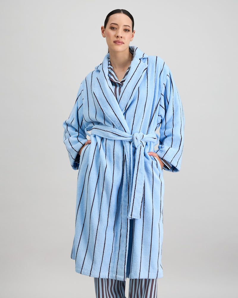 Model wears Riviera Robe in COOL BLUE. On body front view