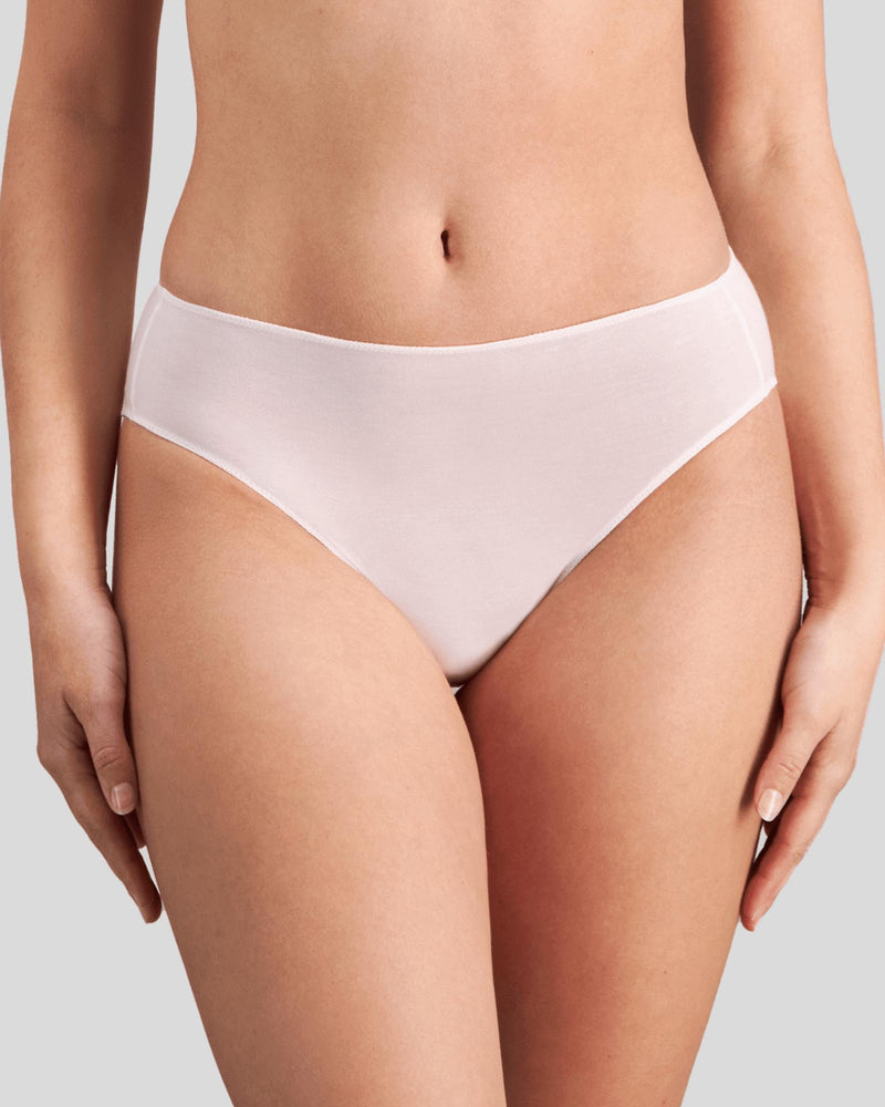 Model wears Au Naturel High Cut Brief in FESTIVAL BLOOM. On body front view