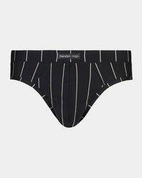Model wears High Tech Cotton Mens Brief in BLACK STRIPE. On body front view