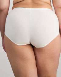 Model wears Body Cotton Full Brief in WHITE. On body back view