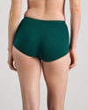 Model wears Body Cotton Full Brief in RAIN FOREST. On body back view