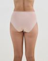 Model wears Stretch Cotton Full Brief in LATTE. On body back view