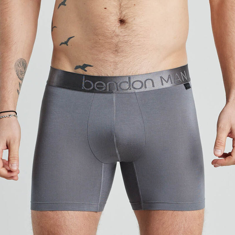 Model wears Bamboo Mens Trunk in ASH. On body front view