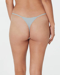 Model wears Clemence Thong in SLATE. On body back view