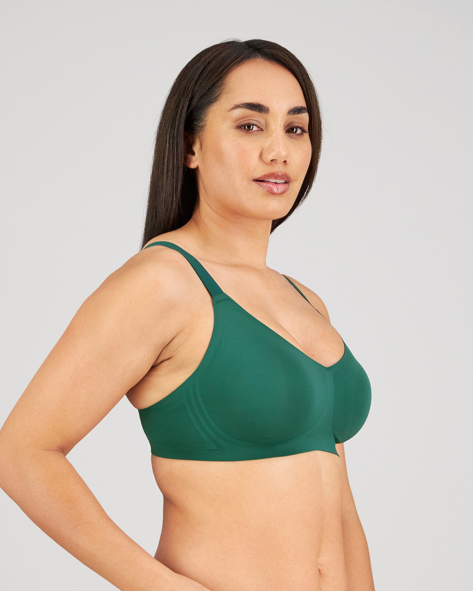 Model wears Comfit Collection Wire Free Bra in RAIN FOREST. On body side view