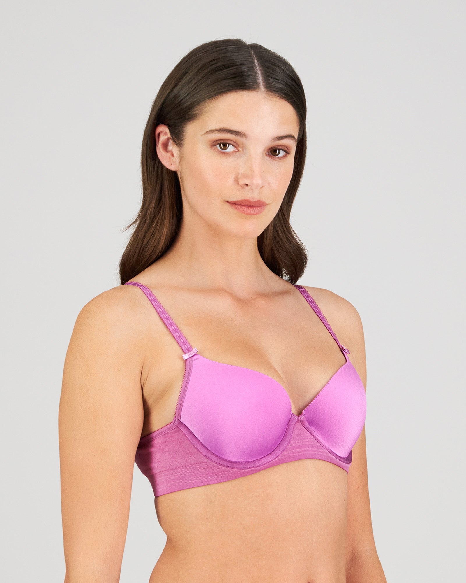 Model wears Bendon Body Contour Bra in RADIANT ORCHID. On body side view