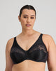 Model wears Classic Underwire Underwire Bra in BLACK. On body front view