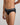 Model wears Cotton Low-Rise Mens Brief in BLACK. On body side view