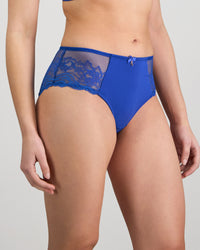 Model wears Intrigue Midi in DAZZLING BLUE. On body side view