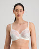 Model wears Yvette Underwire Bra in WHITE. On body front view
