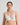 Model wears Yvette Underwire Bra in WHITE. On body front view