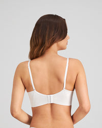 Model wears Play Contour Long Line Bra in WHITE. On body back view