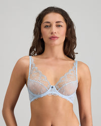 Model wears Etienne Underwire Bra in SKYWAY. On body side view