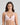 Model wears Simply Seamless Wire Free Bra in ICY PINK/WHITE STRIPE. On body front view