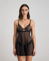 Model wears Ava Rose Babydoll in BLACK. On body front view