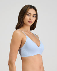 Model wears Comfit Collection Wire Free Bra in SKYWAY. On body side view