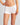 Model wears Simply Seamless Boyshort in WHITE. On body front view