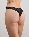 Model wears My Fit Lace Thong in BLACK. On body front view