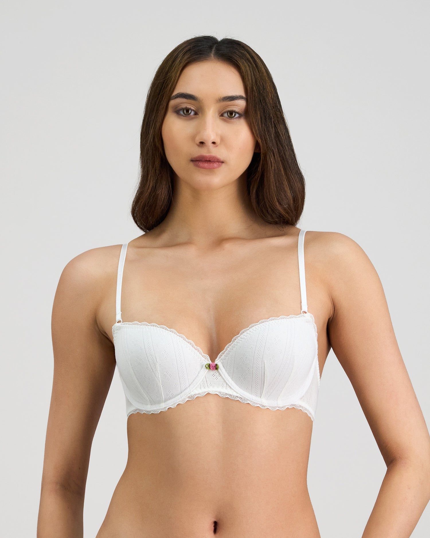Model wears Body Cocoon Contour Bra in WHITE. On body front view