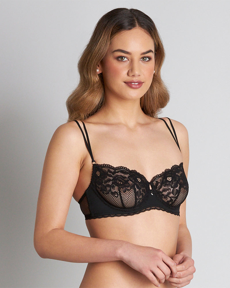 Model wears Delightfully So Underwire Bra in BLACK. On body side view
