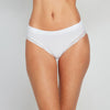 Model wears Nikki Bikini in WHITE. On body front view