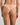 Model wears My Fit Lace Thong in EVENING SAND. On body back view