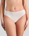 Model wears Au Naturel High Cut Brief in WHITE. On body front view