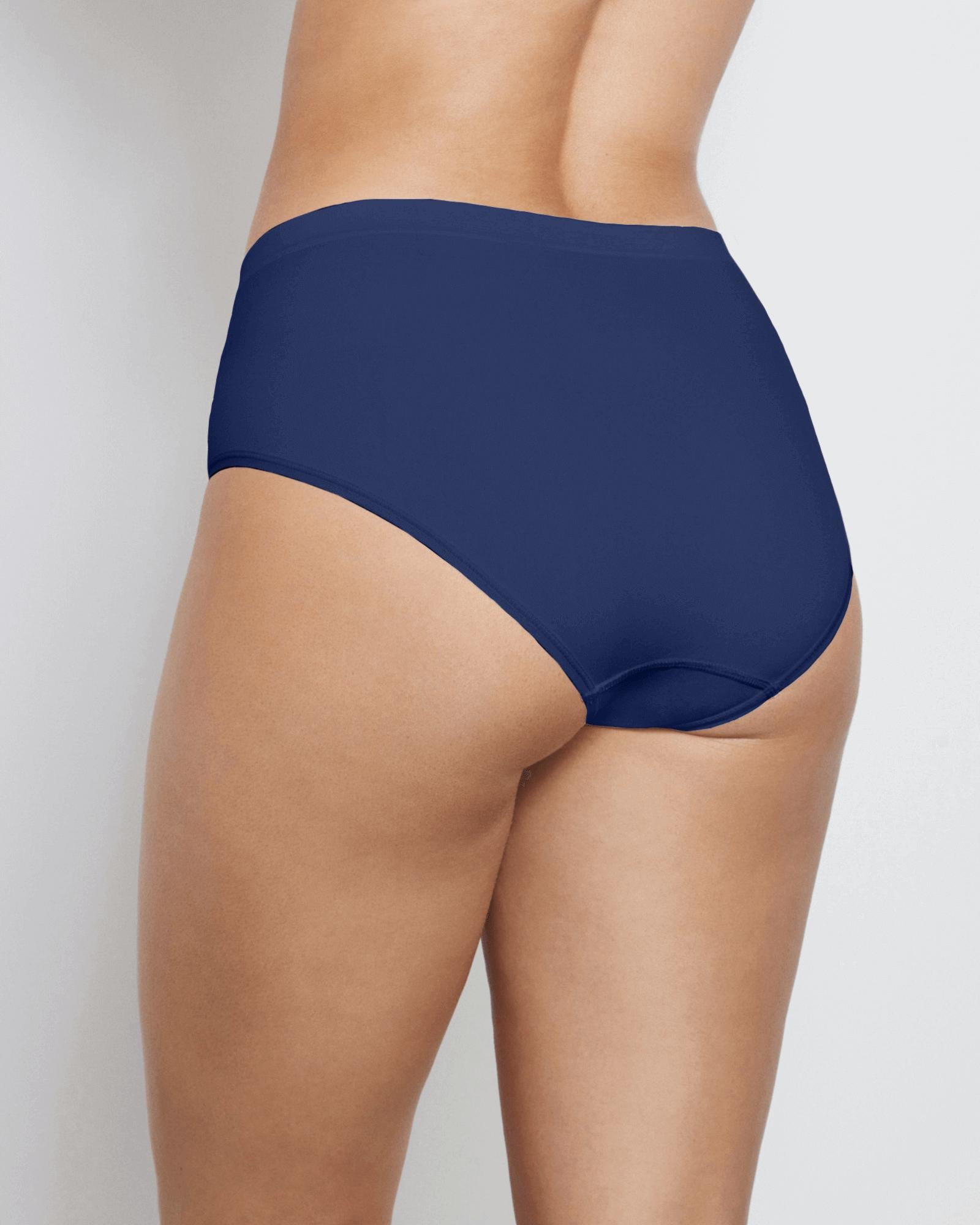 Model wears Seamless Soft Full Brief in Medieval Blue. On body back view