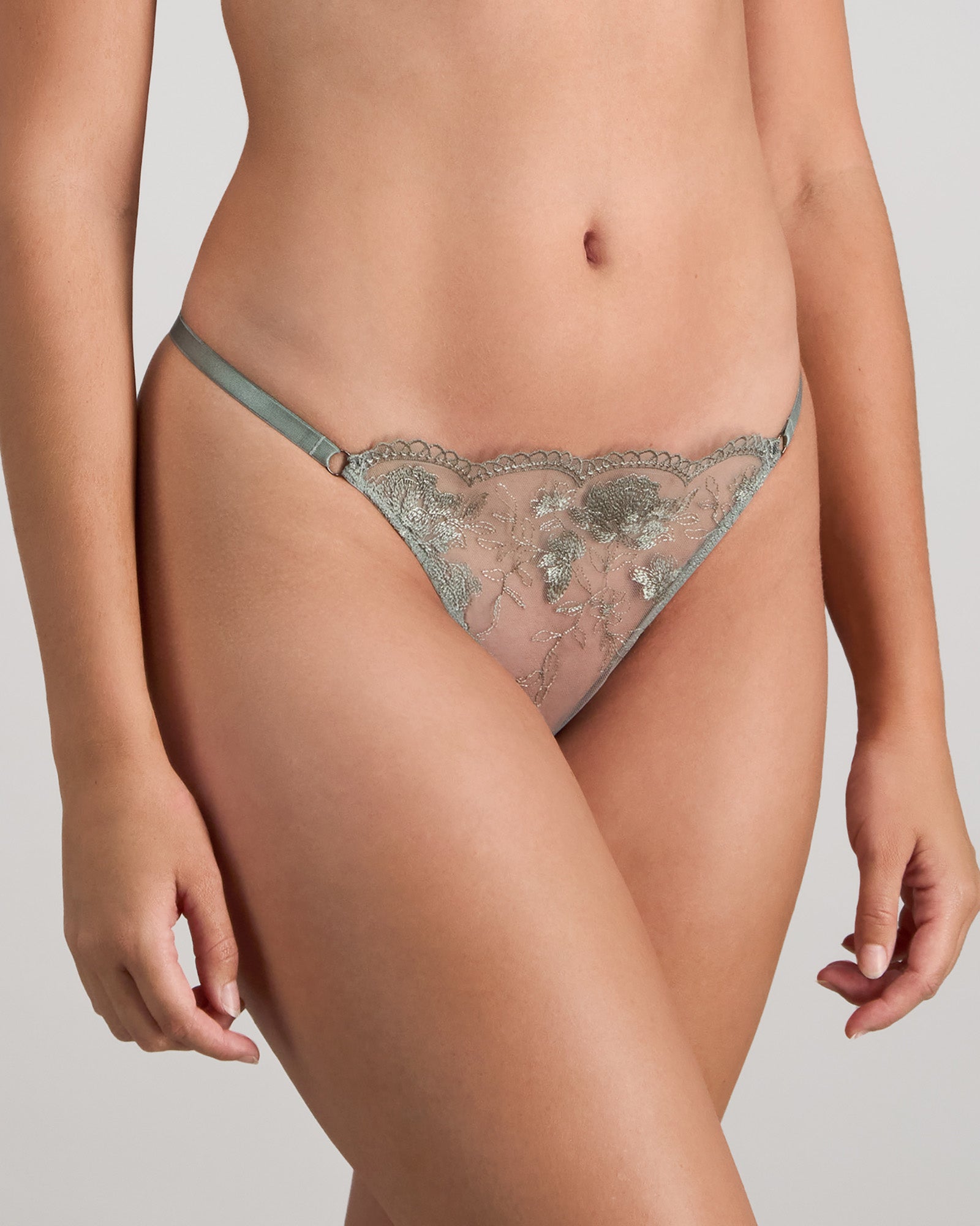 Model wears Romilly Thong in ICEBERG GREEN. On body side view