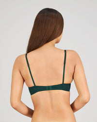 Model wears Sofia Contour Bra in RAIN FOREST. On body back view