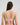 Model wears Midnight Express Underwire Bra in PALE LILAC. On body back view