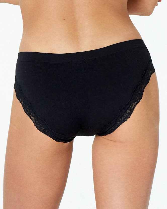 Model wears Nikki Bikini in BLACK. On body back view