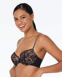 Model wears Naturally Me Contour Bra in BLACK. On body side view