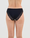 Model wears Cotton And Lace Bikini in BLACK. On body back view