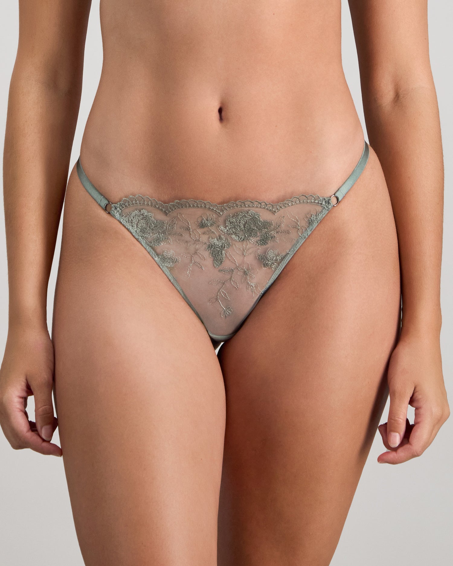 Model wears Romilly Thong in ICEBERG GREEN. On body front view