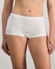 Model wears Simply Seamless Boyshort in WHITE. On body front view
