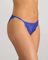 Model wears Midnight Muse Tanga in DAZZLING BLUE. On body side view
