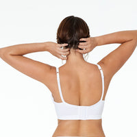 Model wears Castaspell Contour Long Line Bra in WHITE. On body back view