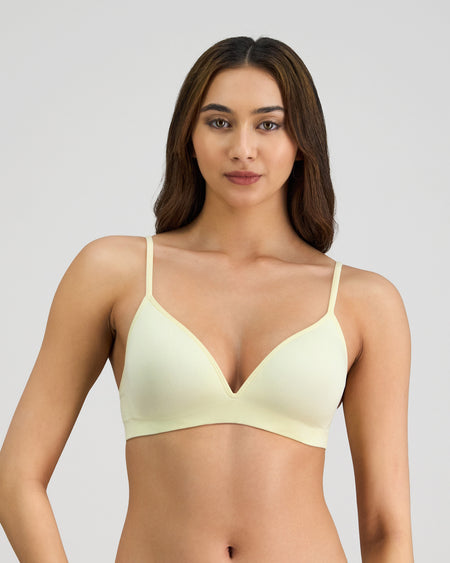Model wears Simply Seamless Wire Free Bra in TRANSPARENT YELLOW. On body front view
