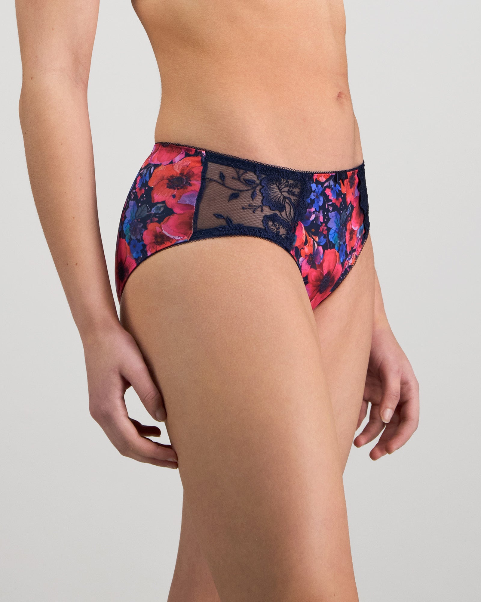 Model wears Wild Violet Full Brief in JAZZY FLORAL PRINT. On body side view